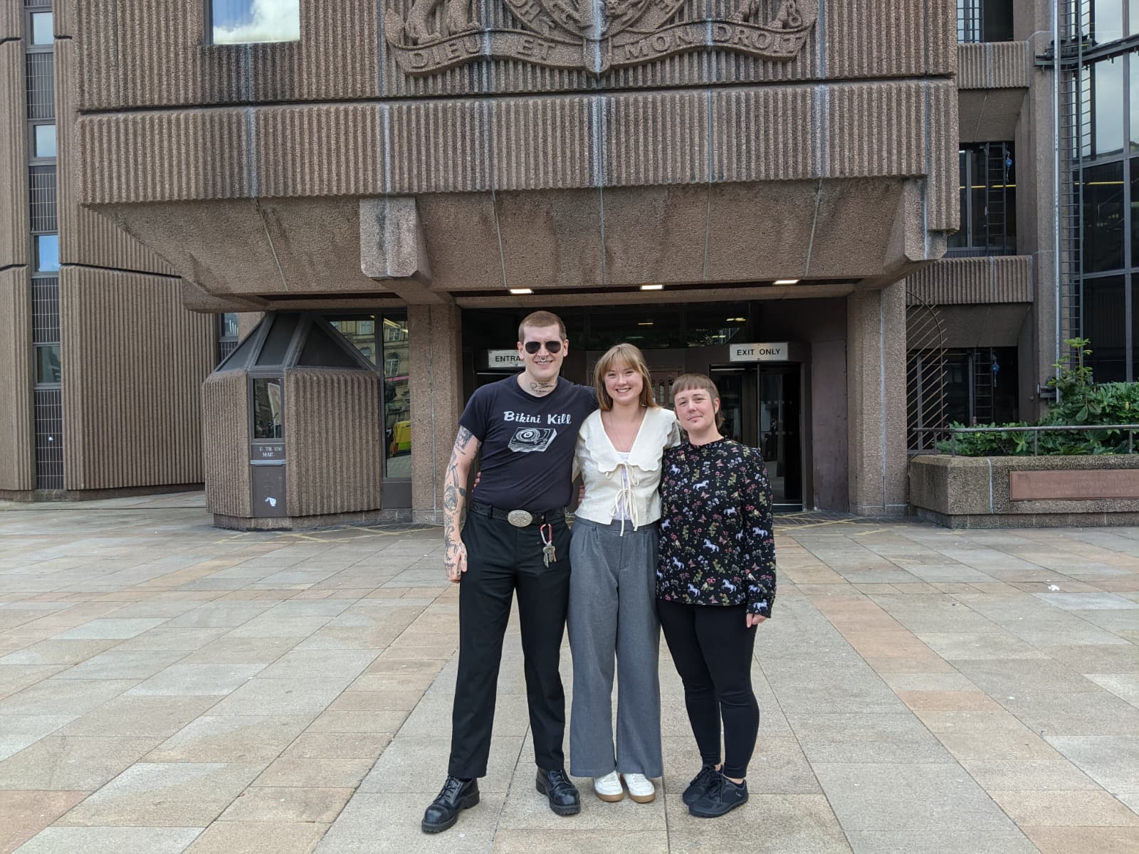 Three defendants from the trial, including Sarah McCaffrey (centre)
